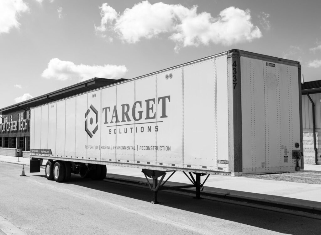 a box trailer with the Target Solutions logo on it