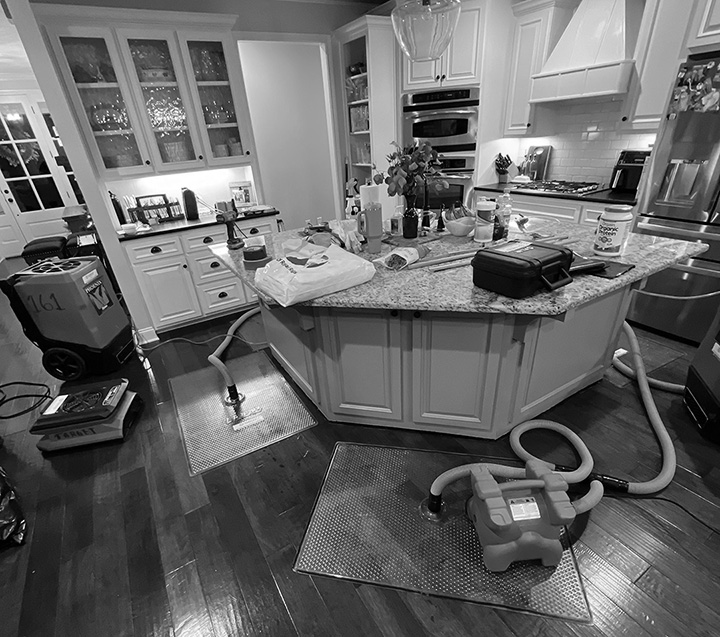 Drying Equipment in residential kitchen following flood